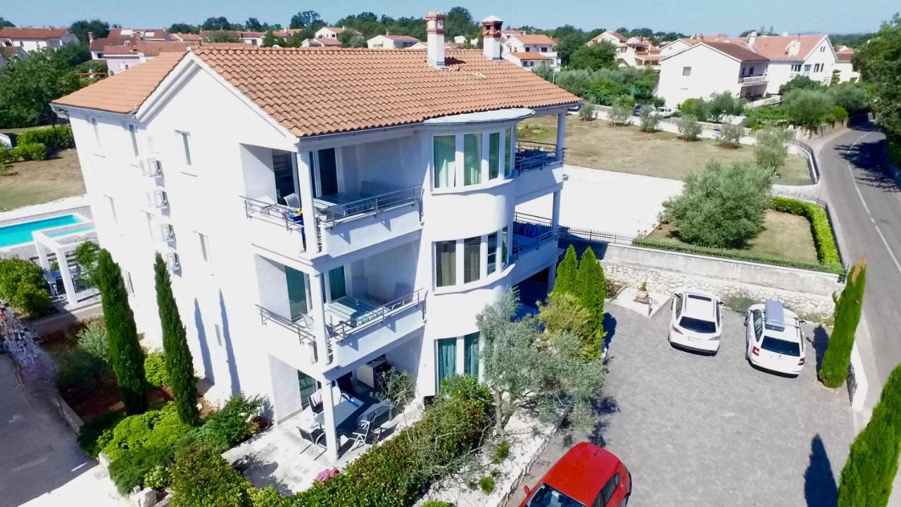 Apartments Kovacic Malinska Buitenkant foto